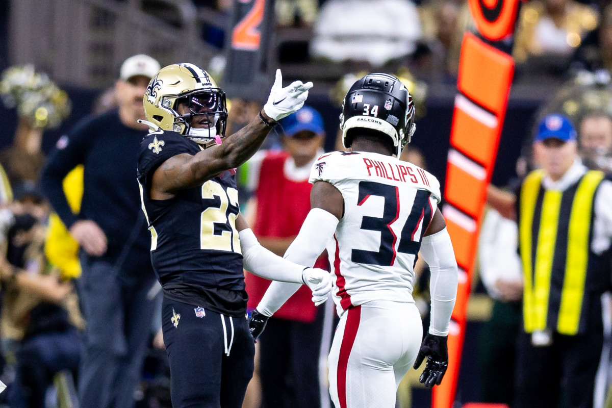 Jan 7, 2024; New Orleans, Louisiana, USA; New Orleans Saints wide receiver Rashid Shaheed (22) reacts to making first down catch against Atlanta Falcons cornerback Clark Phillips III (34) during the first half at Caesars Superdome.